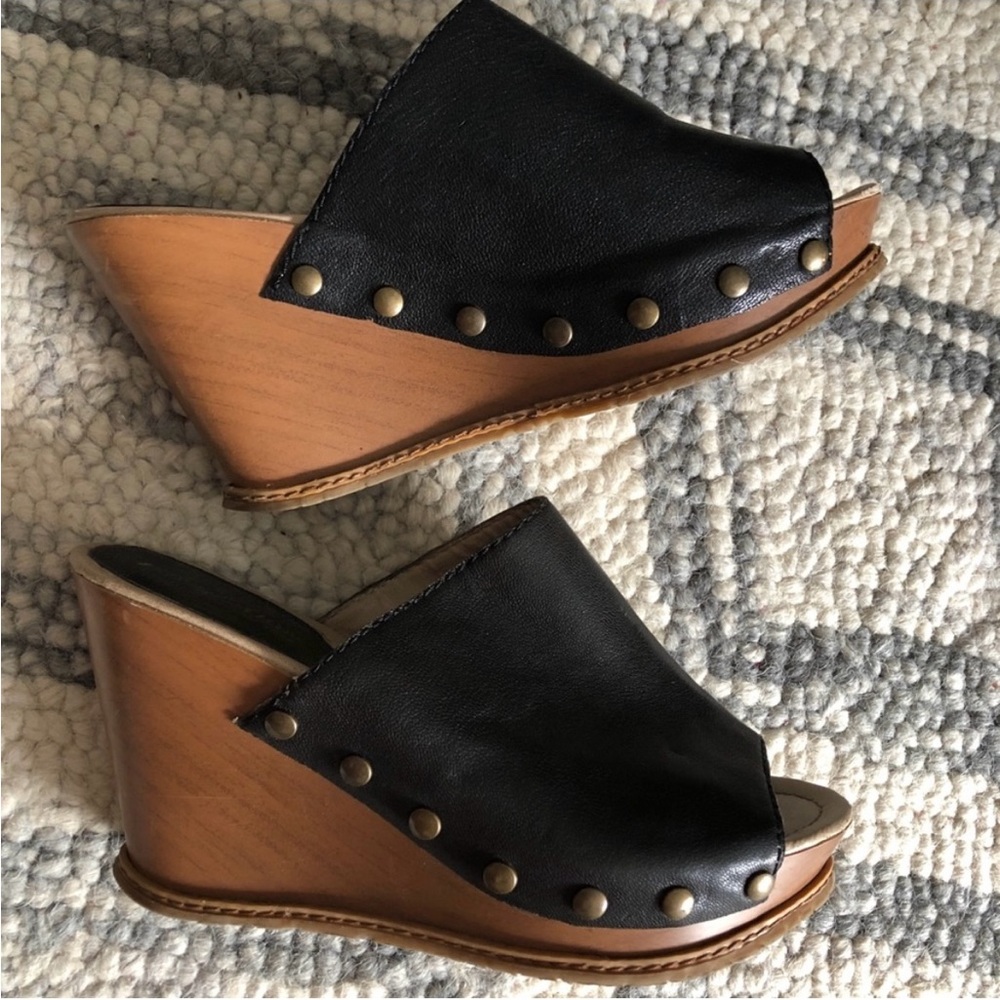Black Leather Wedge. It has visible worn out spots as seen in the photos.